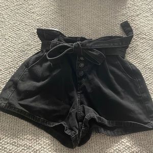 Black jean shorts with a tie